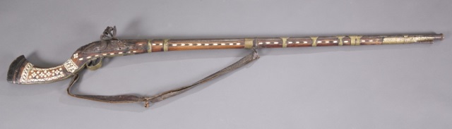 Appraisal: Afghan Flintlock Jezail Musket Decorated with bone inlay and brass