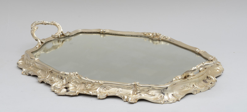 Appraisal: LOUIS XV STYLE SILVERED METAL SURTOUT-DE-TABLE The oblong shaped mirror