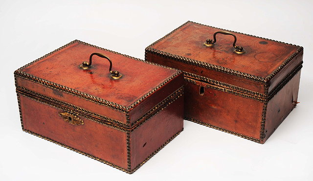 Appraisal: A PAIR OF GEORGE III RED LEATHER AND BRASS STUDDED