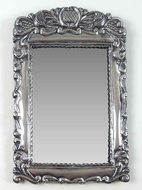 Appraisal: SILVER REPOUSSE WALL MIRROR Repousse floral motif over wood backing