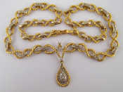 Appraisal: An carat gold diamond pendant necklace drop approx cm cm