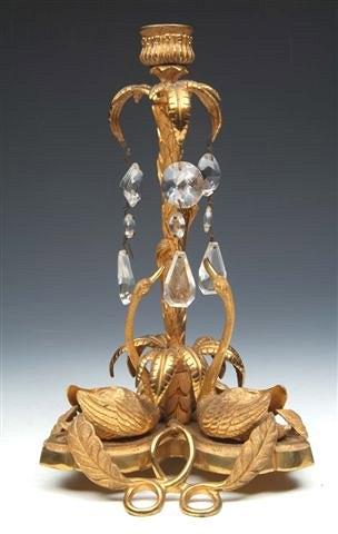 Appraisal: A GILT METAL CANDELABRA with palm tree column and swan