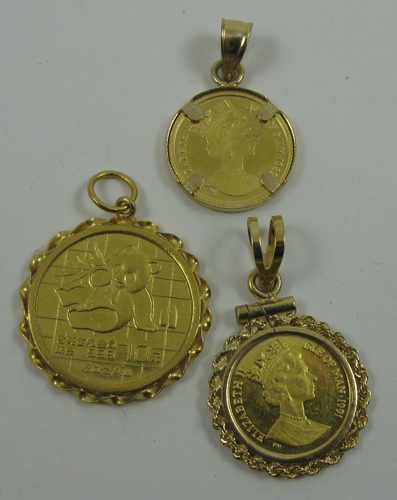 Appraisal: THREE GOLD BULLION COIN AND FOURTEEN KARAT GOLD PENDANTS Isle