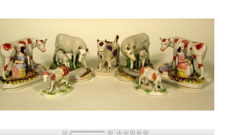 Appraisal: Group of Staffordshire cow figure groups th century