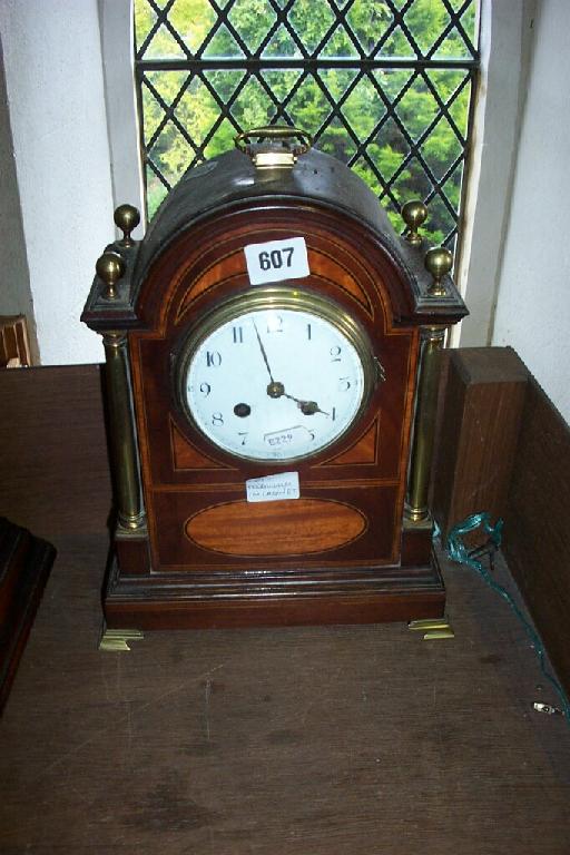 Appraisal: An inlaid Edwardian mahogany bracket clock with satin wood panels