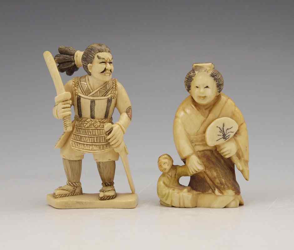 Appraisal: PIECE CARVED IVORY WOMAN AND WARRIOR NETSUKE To include Woman