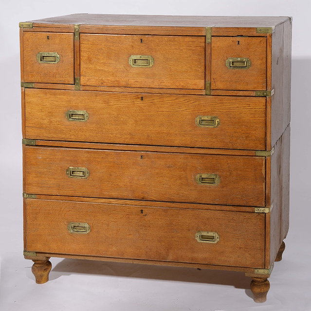 Appraisal: A th Century oak campaign chest of drawerswith three short