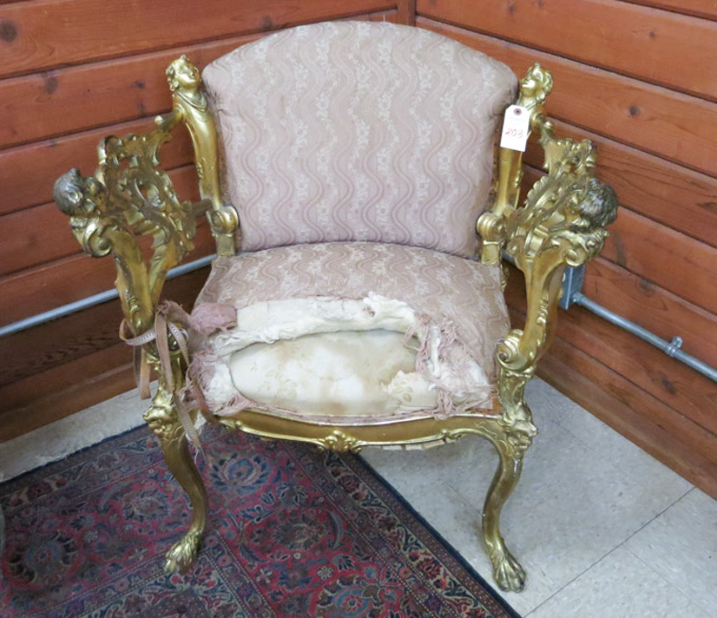 Appraisal: VICTORIAN CARVED GILTWOOD ARMCHAIR American th century having a padded