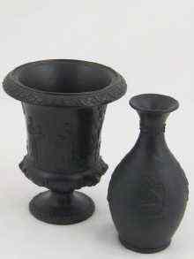 Appraisal: A Wedgwood black basalt urn impressed mark '' Wedgwood ''