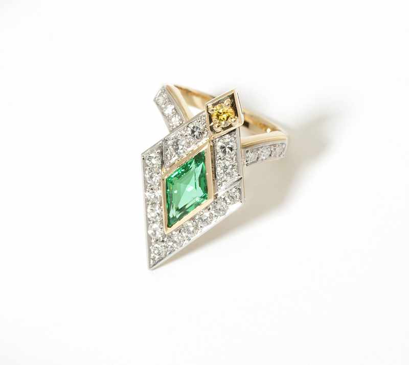 Appraisal: An emerald diamond and gold ring Platinum-topped K gold set