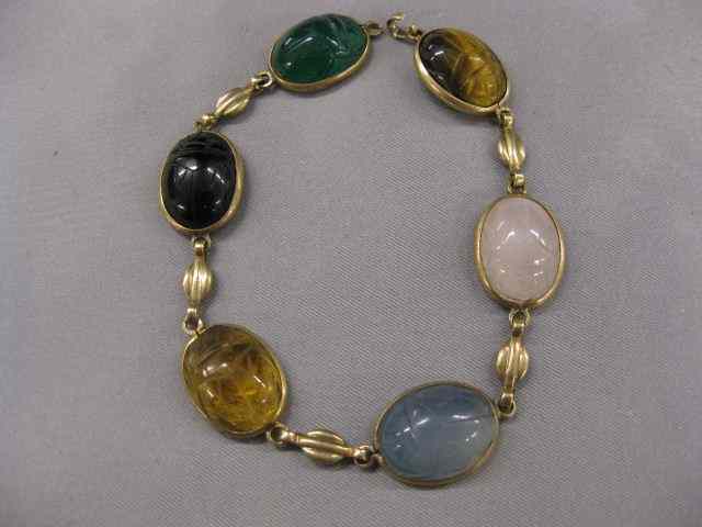 Appraisal: k Gold Scarab Bracelet six various gems in yellow gold