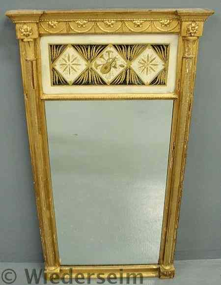 Appraisal: Classical gilt mirror c decorated with rosettes and swags with