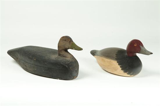 Appraisal: TWO DECOYS American mid th century wood Black duck from