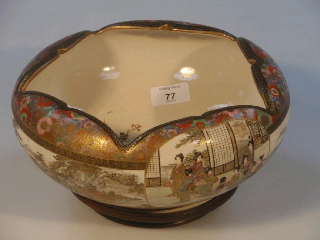 Appraisal: A Japanese Satsuma circular bowl with an incurving moulded rim