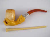 Appraisal: A boxed meerschaum pipe with amber stem and silver mount