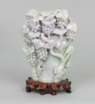 Appraisal: A Carved Lavender and Green Jade Ornament Chinese A carved