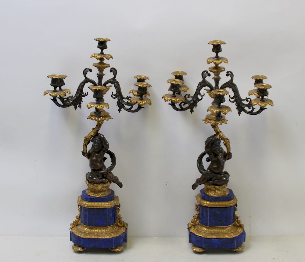 Appraisal: Pair of patinated Gilt Bronze and Lapis Figural Candlebra From