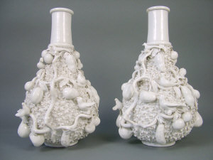 Appraisal: A pair of Meissen blanc de chine bottle vases the