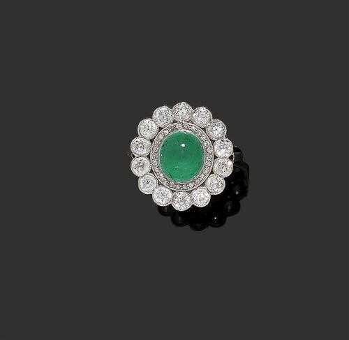 Appraisal: EMERALD AND DIAMOND RING ca Platinum Decorative model the top