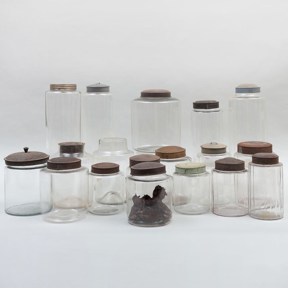 Appraisal: Group of Eighteen Glass Storage Jars with Seventeen Metal Covers