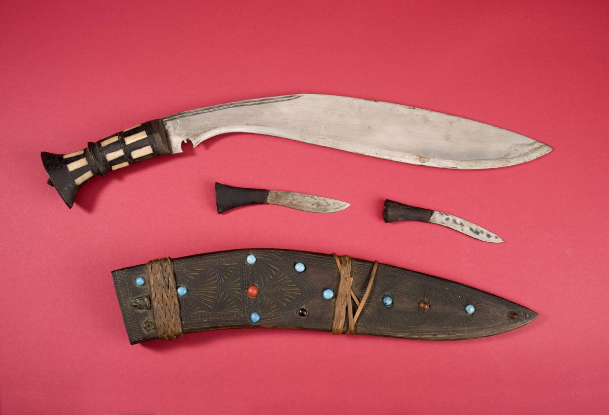 Appraisal: ELABORATE NEPALESE KHUKHRI WITH BONE INLAID HILT AND DECORATED SCABBARD