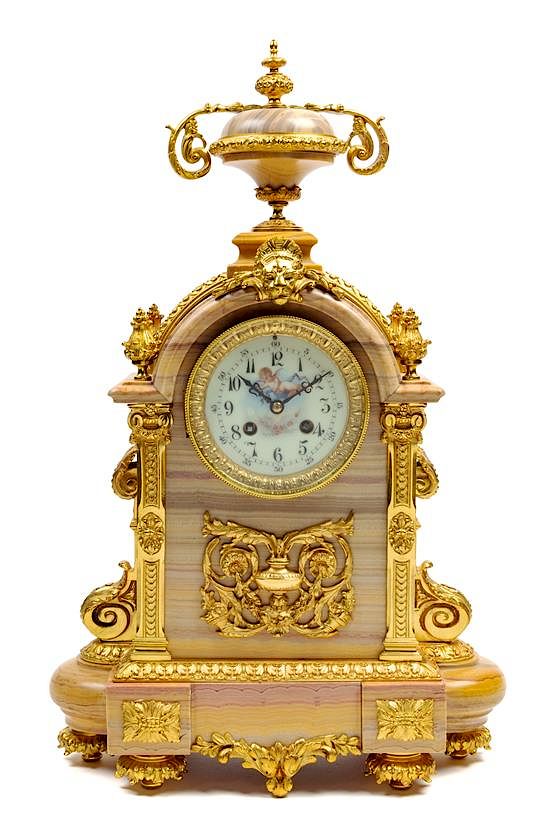 Appraisal: A Louis XVI Style Gilt Metal and Marble Clock Height