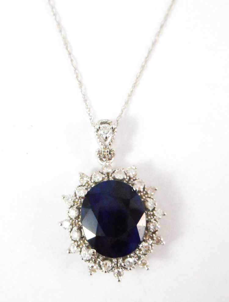 Appraisal: SAPPHIRE AND DIAMOND PENDANT NECKLACE with a k white gold