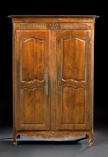 Appraisal: Provincial Louis XV-Style Walnut Armoire third quarter th century the