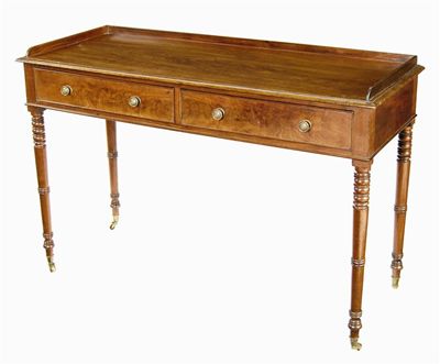 Appraisal: A Regency mahogany dressing table the moulded edge top with