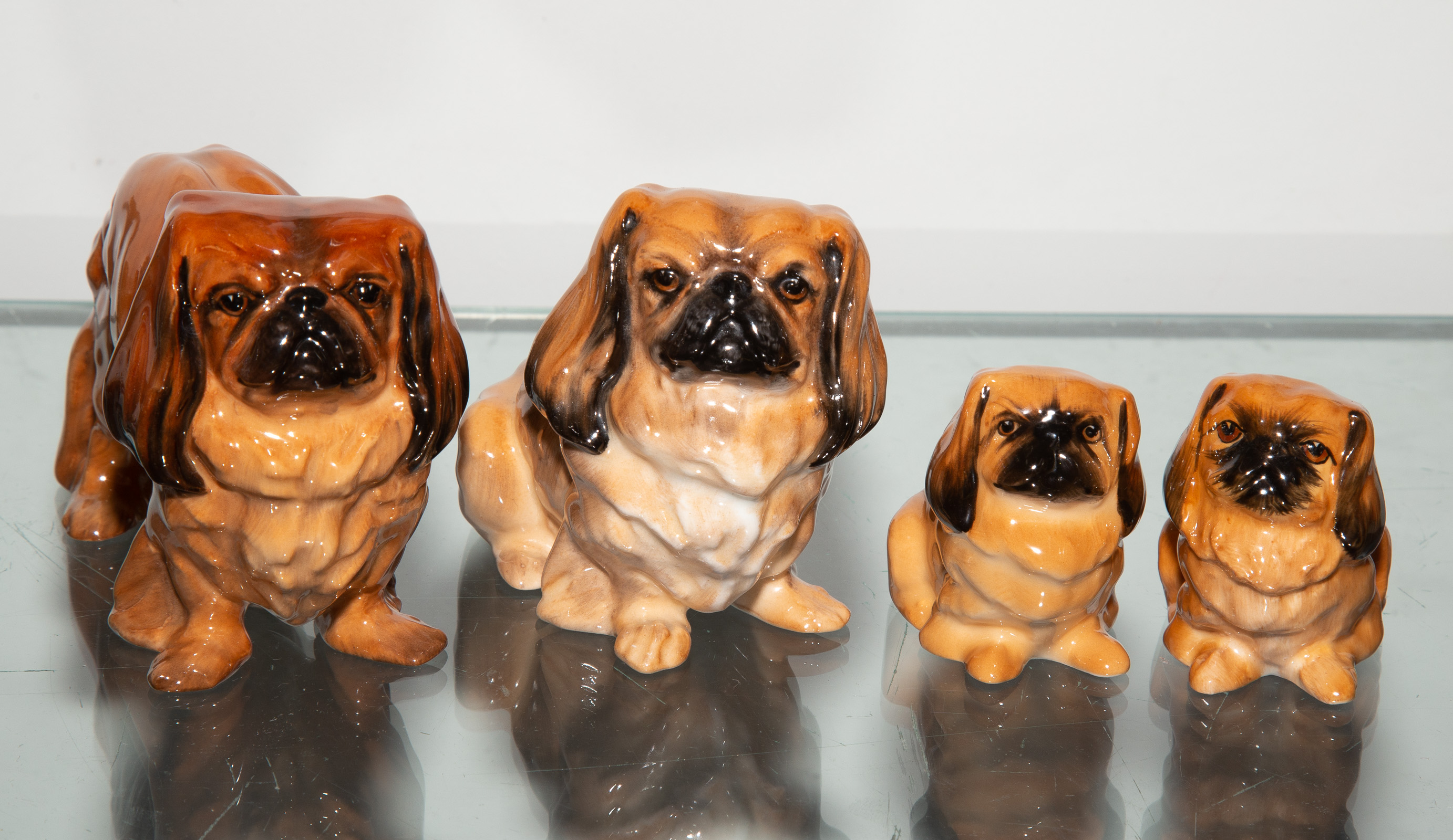 Appraisal: FOUR ROYAL DOULTON DOG FIGURES