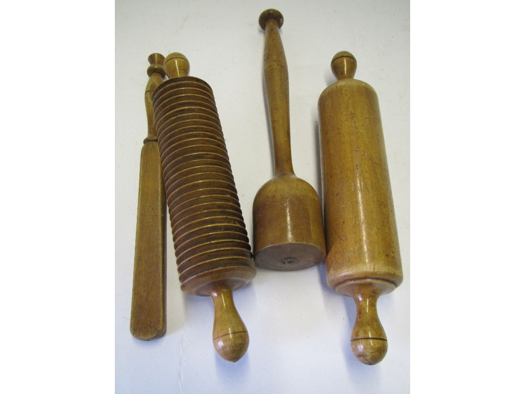 Appraisal: Lot comprising four pieces of treen - miniature rolling pin