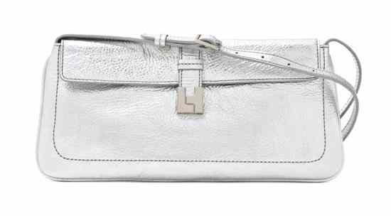 Appraisal: A Lambertson Truex Silver Metallic Pebbled Leather Clutch silver hardware