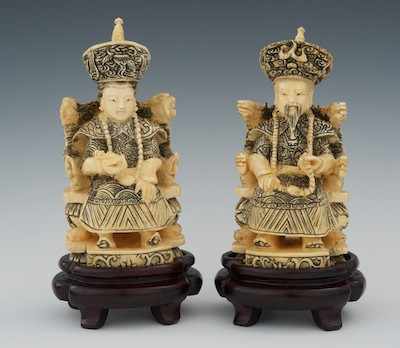 Appraisal: A Pair of Chinese Carved Ivory Seated Emperor Empress Seated