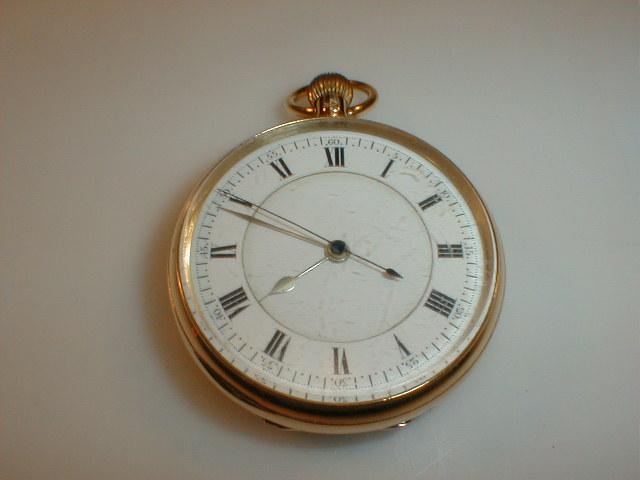 Appraisal: An ct gold open faced stop watch pocket watch bezel