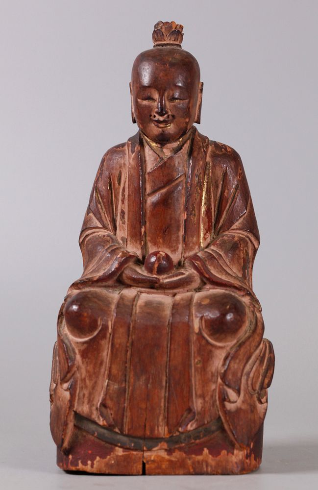 Appraisal: Chinese wooden Buddha possibly th c in H Notice to