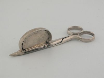 Appraisal: A pair of Queen Anne scissor snuffers with ring handles