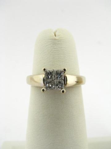 Appraisal: K yellow gold ring with four princess cut invisible set