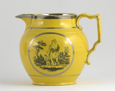 Appraisal: A yellow-glazed pearlware jug printed with a vignette of Charity