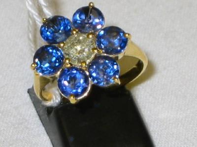 Appraisal: A RING with single diamond approximately cts weight surrounded by