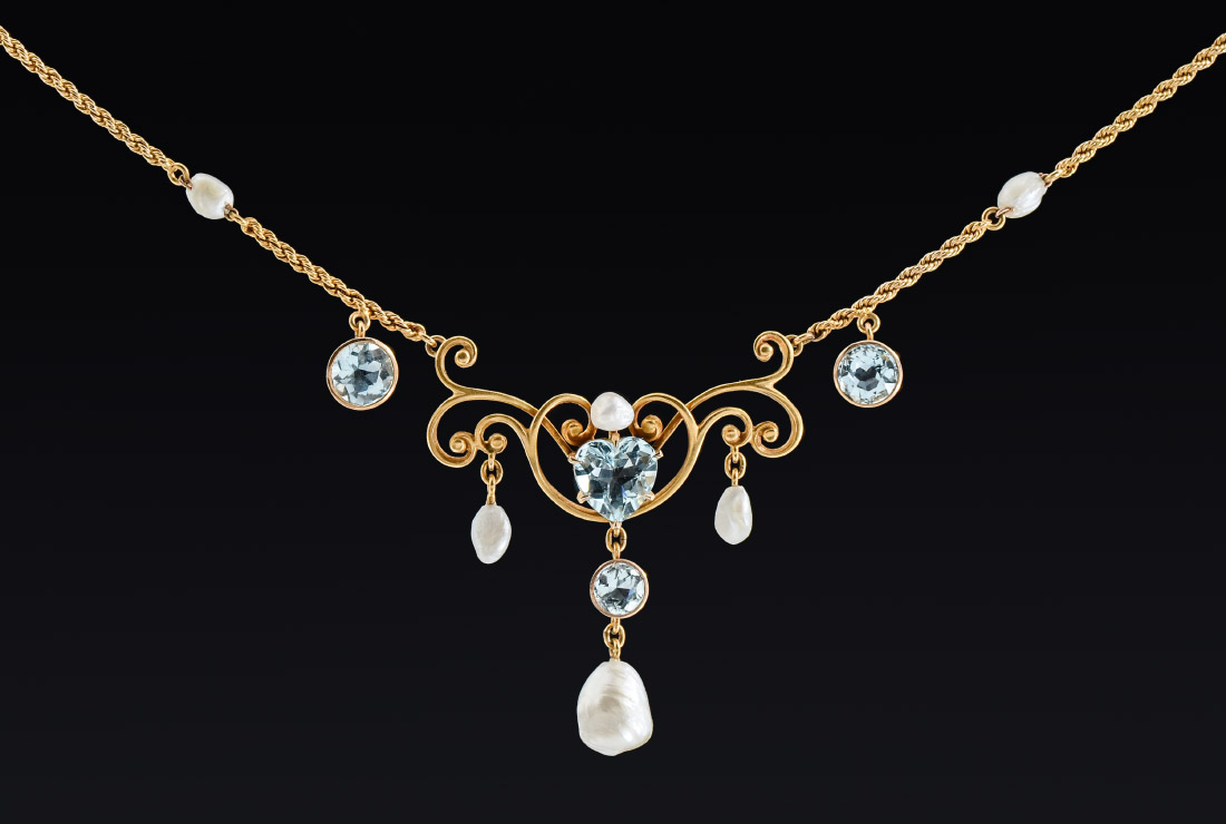 Appraisal: AQUAMARINE AND PEARL LAVALIER NECKLACE K yellow gold necklace featuring