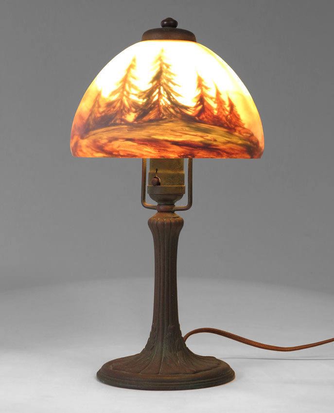 Appraisal: SIGNED HANDEL BOUDOIR LAMP Domed reverse painted shade in a