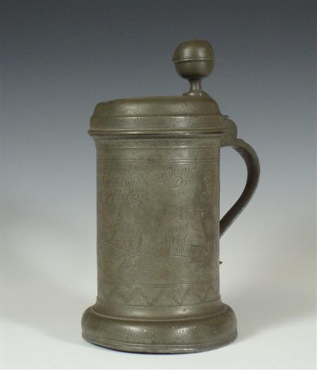 Appraisal: An th century German pewter lidded tankard with pommel thumb