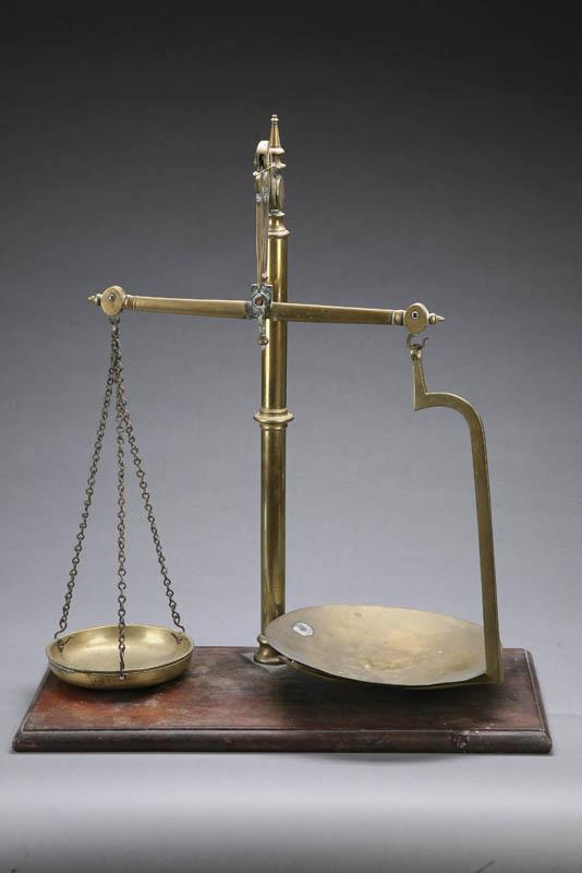 Appraisal: BALANCE SCALES England th century Wooden base with brass pans