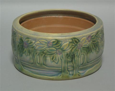 Appraisal: ROSEVILLE VISTA PLANTER Unmarked decorated with tropical plants -- dia