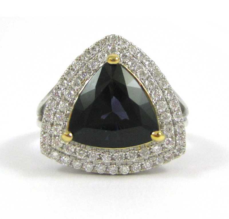 Appraisal: SPINEL DIAMOND AND FOURTEEN KARAT GOLD RING The white and