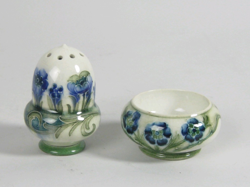 Appraisal: A Moorcroft two piece Condiment Set blue and green poppy