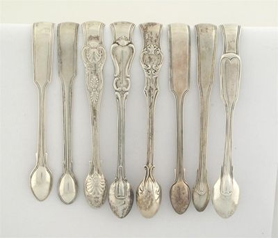 Appraisal: Eight various pairs of tongs with 'patterned' arms mixed makers