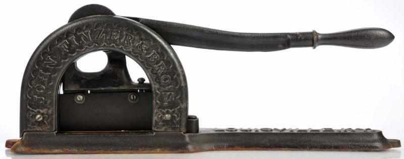 Appraisal: Finzer Plug Tobacco Cutter Description Embossed John Finzer Bro s