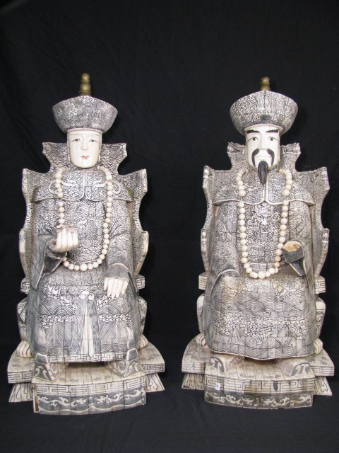 Appraisal: Large pair Chinese emperor and empress figures with bone inlay