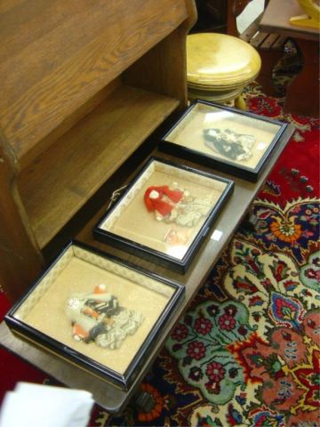 Appraisal: ORIENTAL DOLLS IN SHADOW BOXES